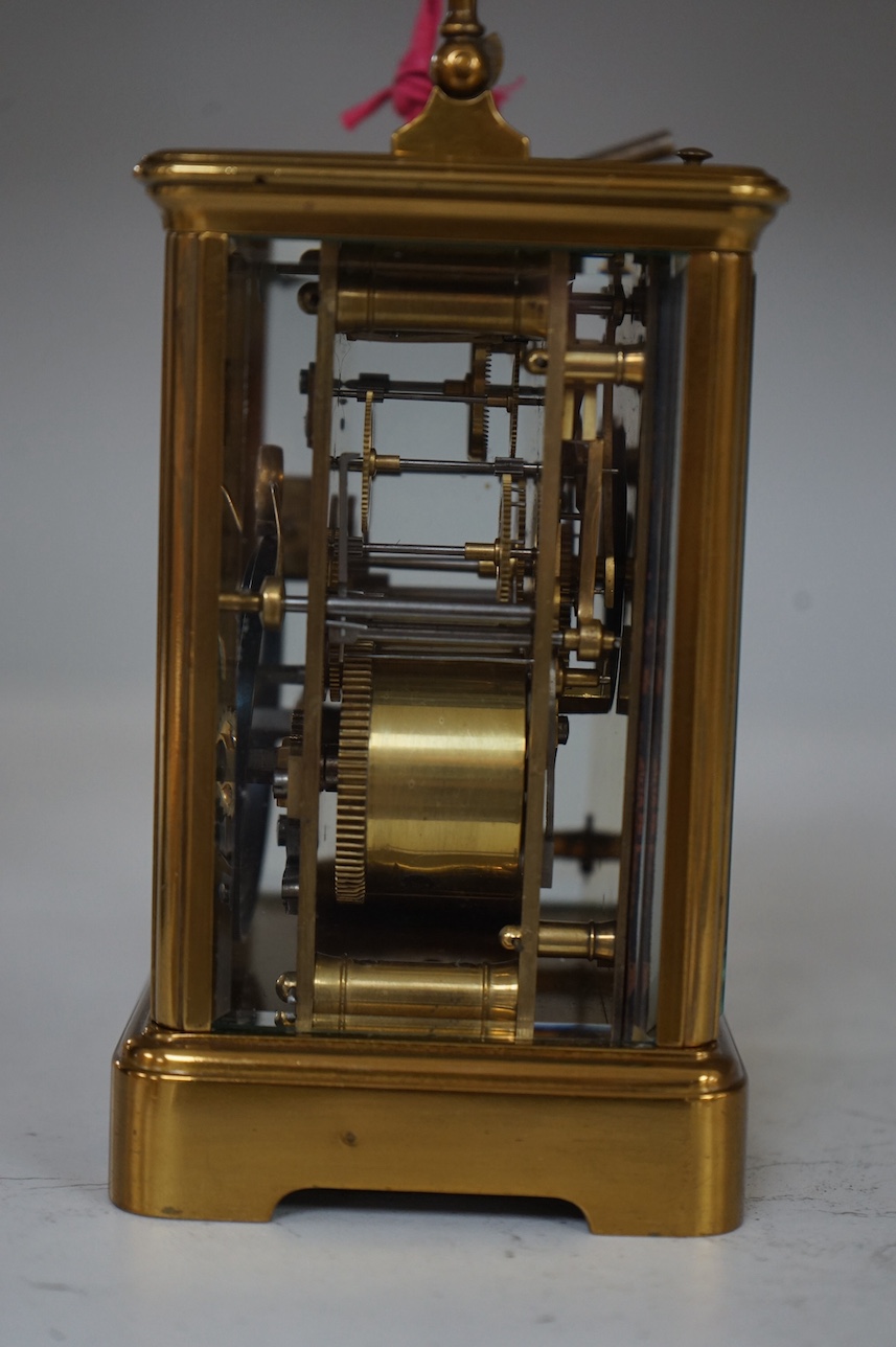 An early 20th century lacquered brass repeating carriage clock, 15cm, with key. Condition - externally good, not tested